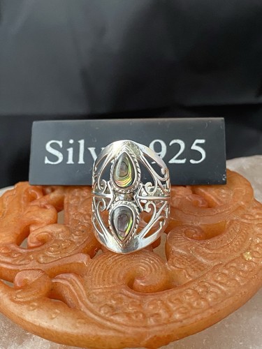 Solid silver and abalone shell - and,
